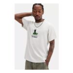 UO Ecru Guinness Turtle T-Shirt
