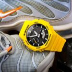 Casio G-Shock Mens Analogue-Digital Watch with Black Dial and Yellow Strap GA-B2100C-9AER W/Code