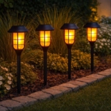 Festive Lights – 4 Pack of 45cm Realistic Flame Effect Black Solar Garden Stake Lights – Sold by Festive Lights Ltd