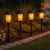 Festive Lights – 4 Pack of 45cm Realistic Flame Effect Black Solar Garden Stake Lights – Sold by Festive Lights Ltd