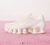 Nike Shox TL pearlised trainers in off white with code