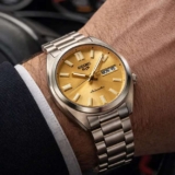 Seiko 5 Sports SNXS Automatic Stainless Steel Gold Dial Mens Watch SRPL59K1