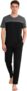 Uniexcosm Mens Cotton Pyjama Set, Short Sleeve Top and Trousers Soft cotton-blend pyjamas with stretch, colour-block top, chest pocket and full-length trousers for sleep and lounging.